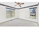 Bright bedroom with border accent and large windows for natural light at 115 Green Sw St, Concord, NC 28027