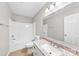 Bathroom features a shower-tub combo and granite countertops at 116 Ridgewood Dr, York, SC 29745