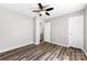 Bedroom with hardwood floors, ceiling fan, closet and hall access at 116 Ridgewood Dr, York, SC 29745