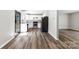 View of the kitchen featuring white cabinets, stainless steel appliances, and access to a backyard at 116 Ridgewood Dr, York, SC 29745