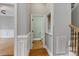 Hallway view of half bath at 116 Whispering Cove Ct, Mooresville, NC 28117