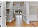 Spacious foyer with hardwood floors and staircase at 116 Whispering Cove Ct, Mooresville, NC 28117