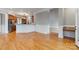 Open concept living and kitchen area with hardwood flooring and large counter space at 116 Whispering Cove Ct, Mooresville, NC 28117