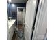 Bathroom featuring double sinks, modern fixtures, and an open doorway to shower at 120 Parson Ln, Statesville, NC 28625