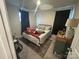 Bedroom with carpet flooring, window, dark curtains, and dresser at 120 Parson Ln, Statesville, NC 28625