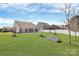 A house with a patio and large backyard with grass at 1224 Horsesugar Rd, Clover, SC 29710