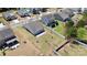 Aerial view of backyard featuring a patio, well-maintained lawn, and privacy fence, perfect for outdoor living at 1224 Horsesugar Rd, Clover, SC 29710