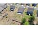 Aerial view of a large backyard featuring mature trees, and a patio, ideal for entertaining and relaxation at 1224 Horsesugar Rd, Clover, SC 29710