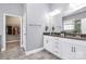 Spacious bathroom featuring a walk-in closet and double sink vanity, providing ample storage at 1224 Horsesugar Rd, Clover, SC 29710