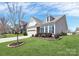 Well-maintained single-Gathering home with lush green lawn and mature tree in a lovely neighborhood at 1224 Horsesugar Rd, Clover, SC 29710