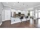 Bright kitchen featuring granite countertops, stainless steel appliances, and a stylish breakfast bar with pendant lighting at 1224 Horsesugar Rd, Clover, SC 29710