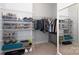 Walk-in closet providing ample shelving and storage, perfect for organization and convenience at 136 Morgans Branch Rd, Belmont, NC 28012