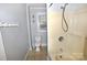 Bathroom featuring a shower, toilet, tiled floor, and a window at 1460 Legion Club Rd, Salisbury, NC 28146
