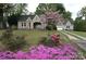Charming home with blooming bushes and a two-car garage at 1460 Legion Club Rd, Salisbury, NC 28146