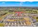 Aerial view of a community featuring manicured lawns, tree lines, and similar home styles at 14921 Baldridge Dr, Huntersville, NC 28078