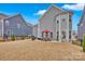 Shot of backyard showing the patio and back of the house which features a bay window at 14921 Baldridge Dr, Huntersville, NC 28078