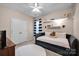 Charming bedroom with striped curtains, ceiling fan, and soft carpet at 14921 Baldridge Dr, Huntersville, NC 28078