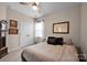 Bedroom with light colored walls, carpet, a window, and neutral decor at 14921 Baldridge Dr, Huntersville, NC 28078