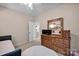 Bedroom with light colored walls, neutral carpet, and ceiling fan at 14921 Baldridge Dr, Huntersville, NC 28078