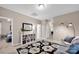 Cozy living room with accent lighting, decorative area rug, and neutral paint at 14921 Baldridge Dr, Huntersville, NC 28078