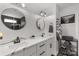 Modern bathroom with dual sinks, quartz countertops, sleek fixtures, and decorative mirrors at 1527 Meadow Glen Ln, Rock Hill, SC 29730