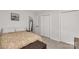 Bedroom featuring neutral carpet, a double bed, and a double closet at 1527 Meadow Glen Ln, Rock Hill, SC 29730