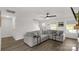 Comfortable living room featuring a large sectional sofa, contemporary decor, and ample natural light at 1527 Meadow Glen Ln, Rock Hill, SC 29730