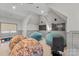Large bonus room with wall-mounted televisions and comfortable beanbag chairs at 1754 Brawley School Rd, Mooresville, NC 28117