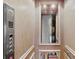 Elevator car with push button controls and a mirrored back wall at 1754 Brawley School Rd, Mooresville, NC 28117