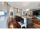 Modern kitchen with stainless steel appliances, a large island, and built-in refrigerator drawers at 1754 Brawley School Rd, Mooresville, NC 28117