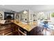 Spacious kitchen featuring a large island with granite countertops and stainless steel appliances at 1754 Brawley School Rd, Mooresville, NC 28117
