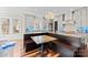 Open kitchen with updated lighting, stainless appliances, and built-in dining at 1754 Brawley School Rd, Mooresville, NC 28117