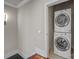 Conveniently located laundry area with stacked washer and dryer units at 1754 Brawley School Rd, Mooresville, NC 28117