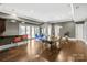 Large recreation room with ping pong table, wet bar, and access to the outdoors at 1754 Brawley School Rd, Mooresville, NC 28117