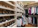 Spacious walk-in closet with custom shelving and storage for shoes, clothes, and accessories at 200 Highland Forest Dr, Charlotte, NC 28270