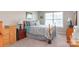 Cozy bedroom with a large window and comfortable furniture, creating a relaxing atmosphere at 2097 Saddlebred Dr, Iron Station, NC 28080