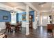 Elegant dining room featuring coffered ceilings, dark hardwood floors, and ample natural light at 2097 Saddlebred Dr, Iron Station, NC 28080