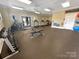 Community gym with treadmills, elliptical machines, weights and space for workout at 2097 Saddlebred Dr, Iron Station, NC 28080