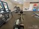 Community gym with cardio machines, free weights, and fitness equipment at 2097 Saddlebred Dr, Iron Station, NC 28080