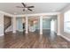 Large living room with hardwood floors, light walls, and open-concept design at 2097 Saddlebred Dr, Iron Station, NC 28080