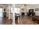 Bright living room featuring hardwood floors, a fireplace, and neutral tones at 2097 Saddlebred Dr, Iron Station, NC 28080