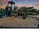 Community playground with slides and climbing equipment for active fun at 2097 Saddlebred Dr, Iron Station, NC 28080