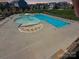 Community pool featuring a lap swimming area and lounge seating at 2097 Saddlebred Dr, Iron Station, NC 28080