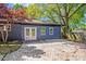 Backyard with double doors and two windows providing natural light at 2109 Tarlton Dr, Matthews, NC 28105
