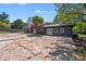 Spacious backyard features a long driveway and well-maintained landscaping at 2109 Tarlton Dr, Matthews, NC 28105