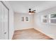 This bedroom features new floors, ample natural light, and ceiling fan at 2109 Tarlton Dr, Matthews, NC 28105
