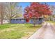A charming one-story home with colorful landscaping at 2109 Tarlton Dr, Matthews, NC 28105