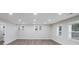Well-lit living room with two windows offering natural light and outdoor views at 2109 Tarlton Dr, Matthews, NC 28105