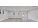 Bright living room with recessed lighting and two windows providing natural light at 2109 Tarlton Dr, Matthews, NC 28105