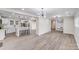 Open-concept living space seamlessly connects the kitchen, dining, and living areas, ideal for entertaining at 2109 Tarlton Dr, Matthews, NC 28105